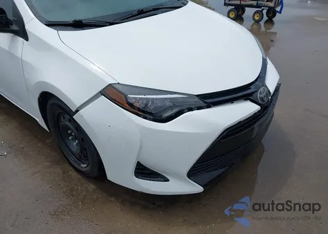 2017 Toyota Corolla Le z USA, uszkodzony, nr VIN 5YFBURHE2HP587255